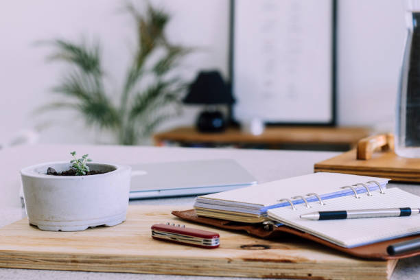 Organised desk with notebook showing lifestyle planning not medical treatment